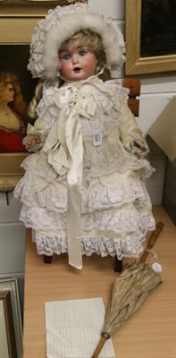 Lot 455 - Schuetzmeister & Quendt bisque socket head doll, impressed 201, with later blonde wig, sleeping...