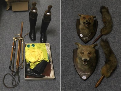 Lot 456 - A collection of hunting related items including a pair of masks on shields, crops with silver...