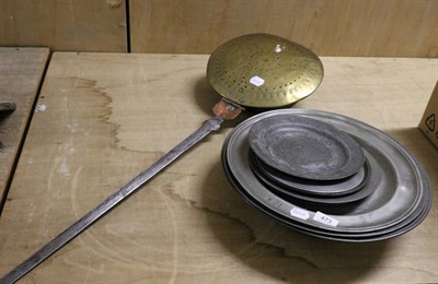 Lot 473 - A brass and copper warming pan, late 17th century, with foliate decoration and steel handle,...