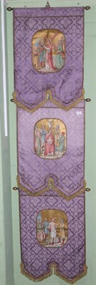 Lot 565 - A set of three silk work pennants, embellished with gilt thread, depicting three stations of...