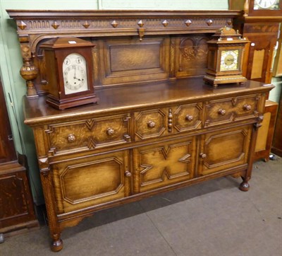 Lot 578 - A carved oak sideboard