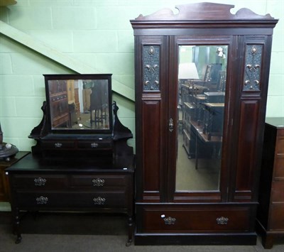 Lot 582 - An early 20th century mahogany two piece bedroom suite in the Art Nouveau style, the wardrobes...