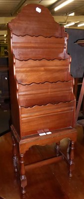 Lot 596 - A mahogany waterfall magazine rack