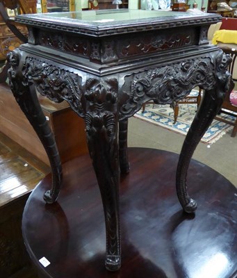 Lot 610 - Chinese carved occasional table