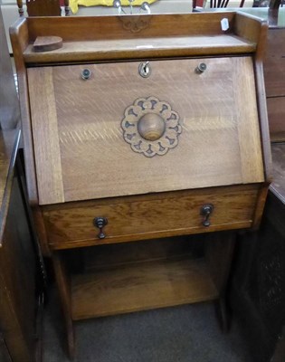 Lot 613 - An oak hall bureau