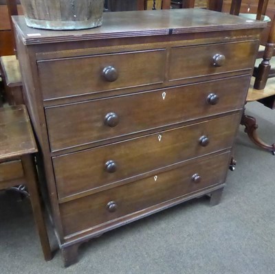 Lot 617 - A 19th century four height chest of drawers