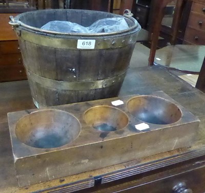 Lot 618 - Brass bound oak bucket and a yew till holder (2)