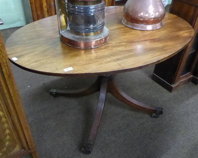 Lot 629 - A mahogany oval tilt top breakfast table