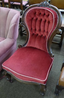 Lot 652 - A Victorian mahogany framed button back nursing chair