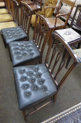 Lot 656 - A 19th century carved oak corner chair with drop in rope work seat