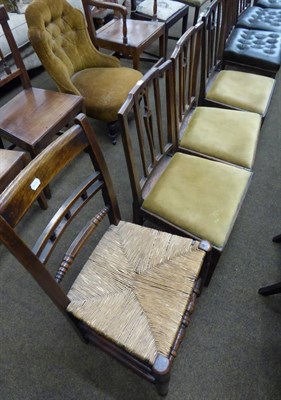 Lot 657 - A set of three mahogany framed dining chairs, in the Hepplewhite style, upholstered in green button