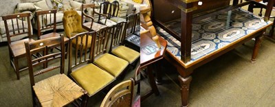 Lot 658 - Three provincial dining chairs with drop in seats, together with three other chairs and a tile...