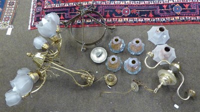 Lot 660 - A six light brass chandelier, a four light chandelier with marble glass shades and a twin light...