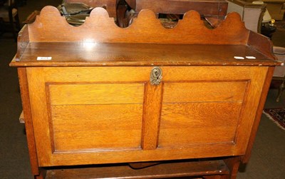 Lot 674 - An oak wall mounted bureau