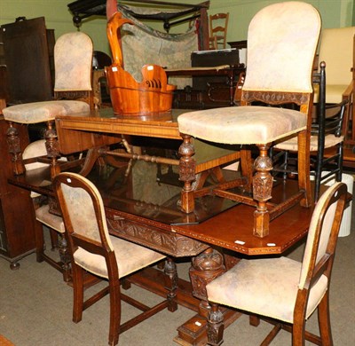 Lot 679 - An oak extending dining table with trestle base and a set of six chairs, a hall mirror and a...