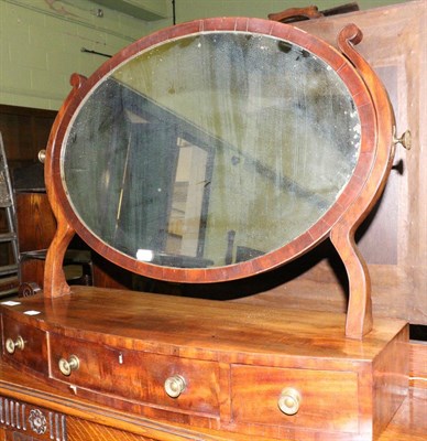 Lot 682 - A late George III toilet mirror