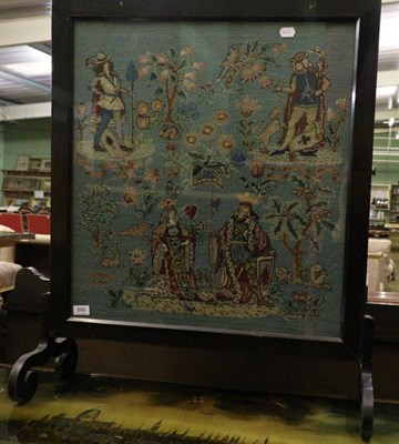 Lot 686 - A needlework firescreen together with a tile top coffee table