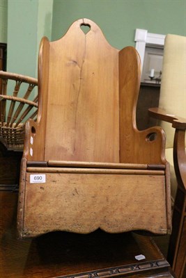 Lot 690 - An early 20th century child's rocking commode chair