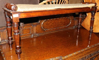 Lot 692 - A 19th century mahogany window seat, scroll ends, turned supports with cushion