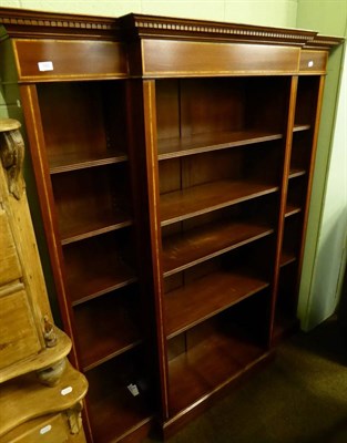 Lot 702 - A Georgian style mahogany breakfront bookcase