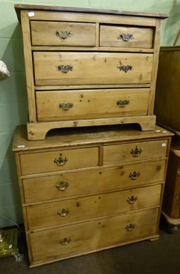 Lot 704 - A pine three height chest of drawers and a pine four height chest of drawers