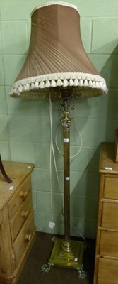 Lot 705 - A brass Corinthian columnar standard lamp