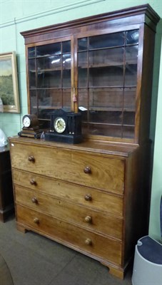 Lot 712 - An early 19th century mahogany secretaire bookcase, with turned wood handles, on bracket feet