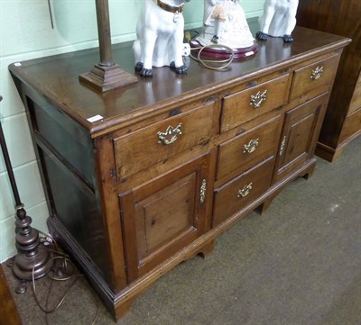 Lot 713 - A George III oak dresser base