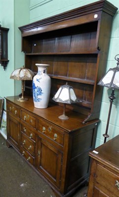 Lot 714 - A 19th century dresser and rack