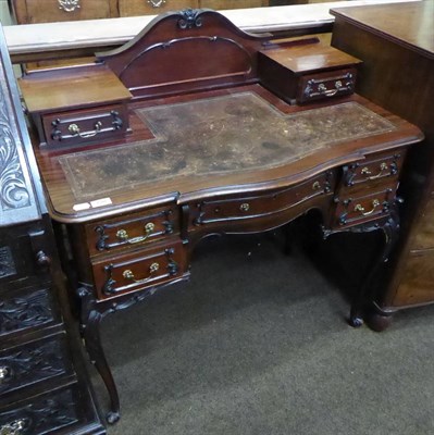 Lot 720 - A mahogany ladies writing desk in the French taste