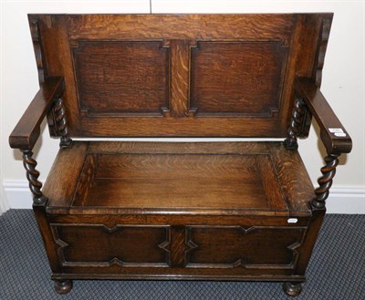 Lot 730 - A 1920's oak monk's bench