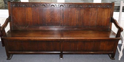 Lot 735 - A twin box settle