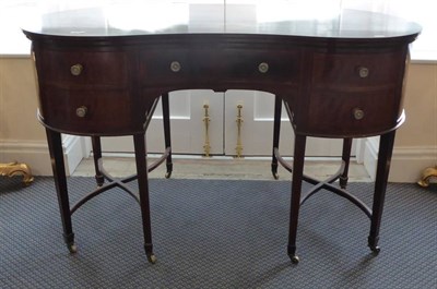 Lot 739 - A kidney shaped Edwardian mahogany desk