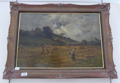 Lot 750 - Oliver Hayes, lady collecting sheathes of corn in a landscape, oil on canvas