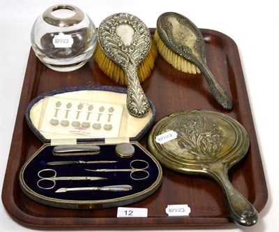 Lot 12 - An Asprey & Co, London, silver mounted hair tidy toy with various silver backed dressing table...