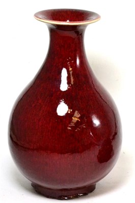 Lot 13 - A sang de boeuf baluster vase