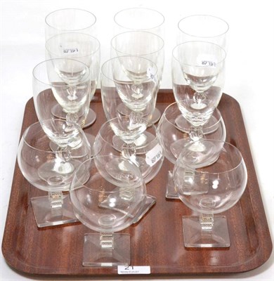 Lot 21 - A set of eight Lalique wine glasses with wrythen stems and footed bases, together with five Lalique