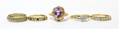 Lot 48 - A 9ct gold amethyst ring, finger size M1/2 and four other 9ct gold gem set rings (5)