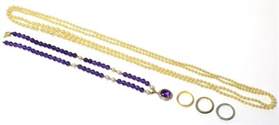 Lot 53 - A 22ct gold band ring, size N1/2, an amethyst bead necklace, a simulated pearl necklace and two...