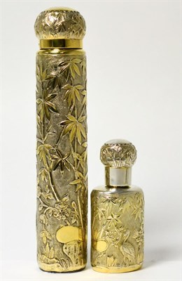 Lot 67 - A silver gilt scent bottle with chinoiserie decoration and another larger example (2)