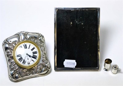 Lot 78 - A Victorian silver mounted dressing table clock, silver frame, miniature silver tankard and...