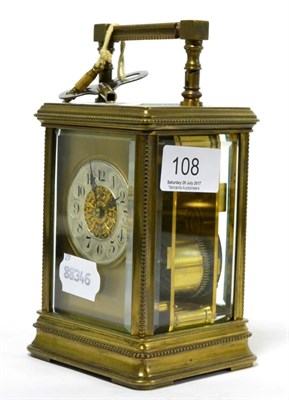 Lot 108 - A brass striking carriage clock, twin barrelled movement striking on a gong, circa 1900