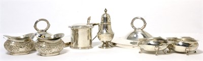 Lot 136 - A pair of George III silver sauce tureen covers; together with a mustard pot and two pairs of...