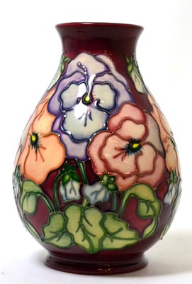 Lot 144 - A Moorcroft vase in the Pansy pattern by Barbara Montford