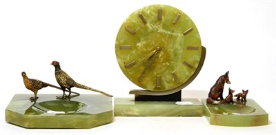 Lot 171 - An onyx ashtray; together with another smaller example with fox and cubs; also a green onyx Art...