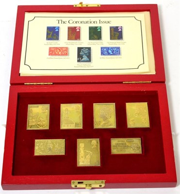 Lot 172 - A cased set of replica stamps for the 25th Anniversary of Queen Elizabeth II Coronation, gold...