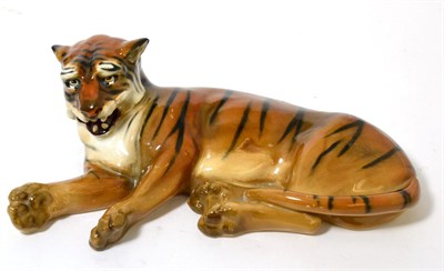 Lot 179 - A Royal Doulton recumbent tiger, HN911