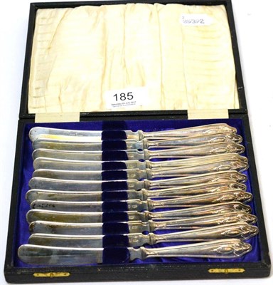 Lot 185 - A set of twelve silver butter knives