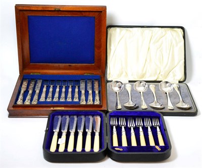 Lot 194 - A 19th century cased set of twelve silver handled cake knives and forks, Sheffield marks with...