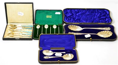 Lot 196 - A Continental silver gilt and enamel set of six pickle forks; with three other cased sets